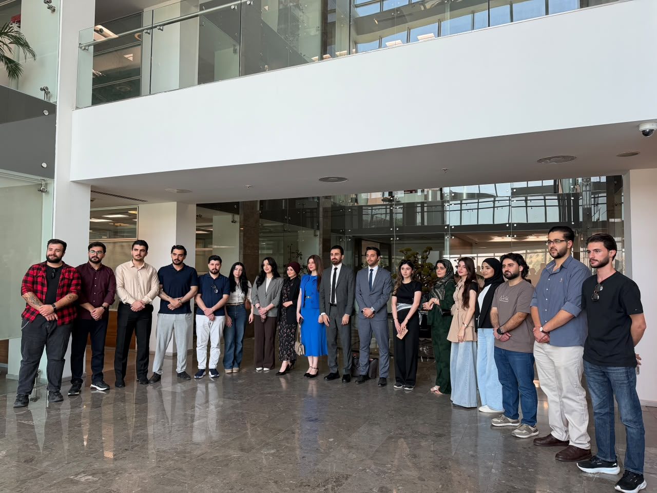 QIU International Business Students Gain Practical HR Insights Through Educational Visit to Halabja Group Photo 2